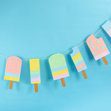 Colorful paper ice cream popsicle garland on a blue background