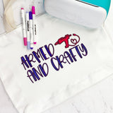 armed and crafty tote bag with glue gun illustration