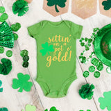 sittin' on a pot o' gold onesie image