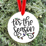 tis the season ornament on a tree